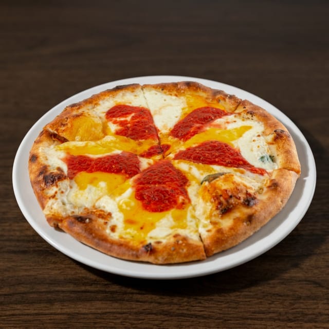 Mama's Famous 4 Cheese Pizza.